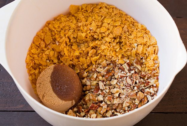 Making cornflake pecan topping for sweet potato casserole.