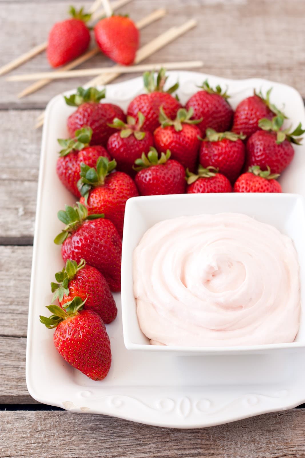 Strawberry Fruit Dip on platter with fresh strawberries