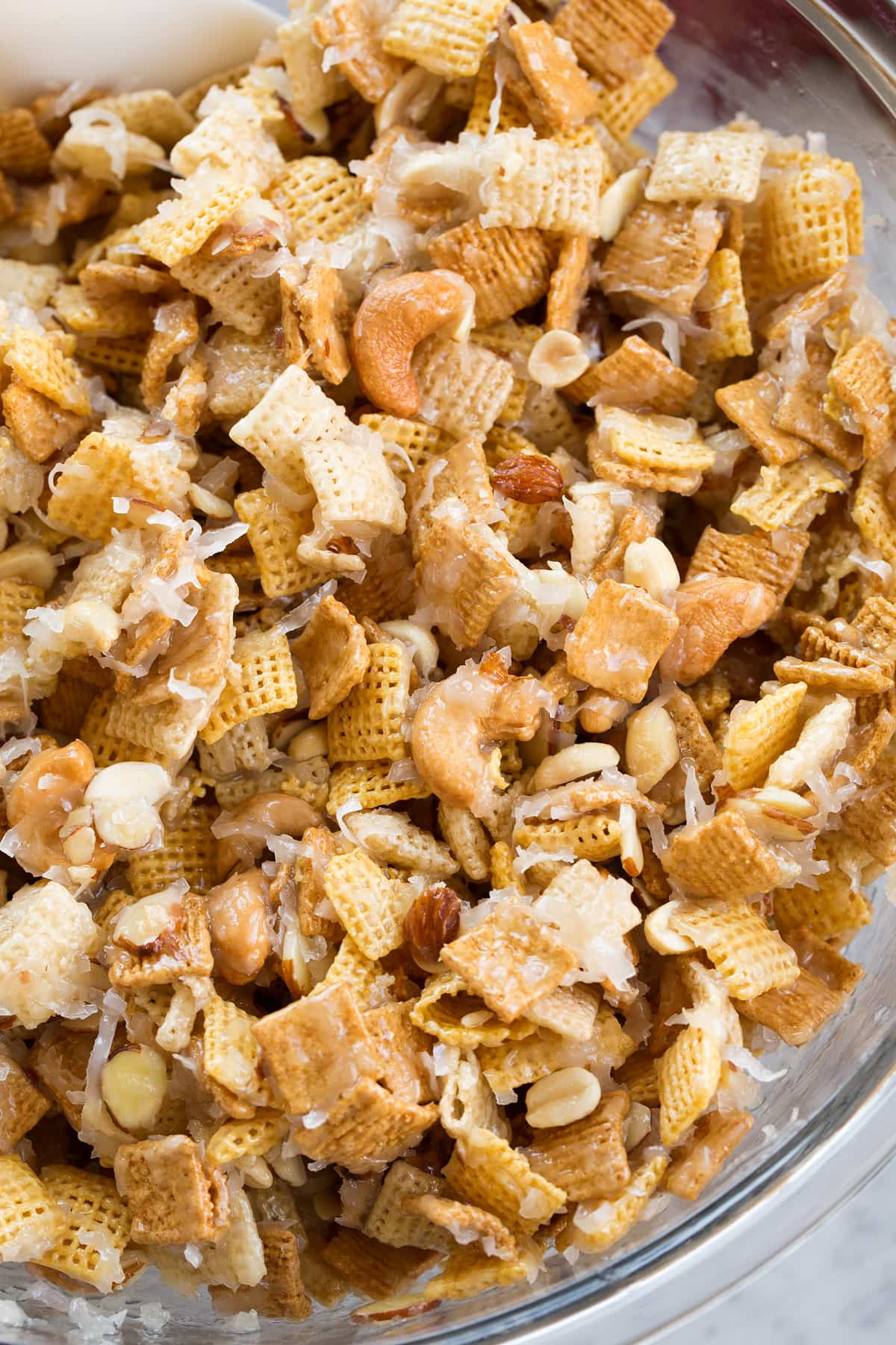 Overhead image of chex mix in a glass bowl.