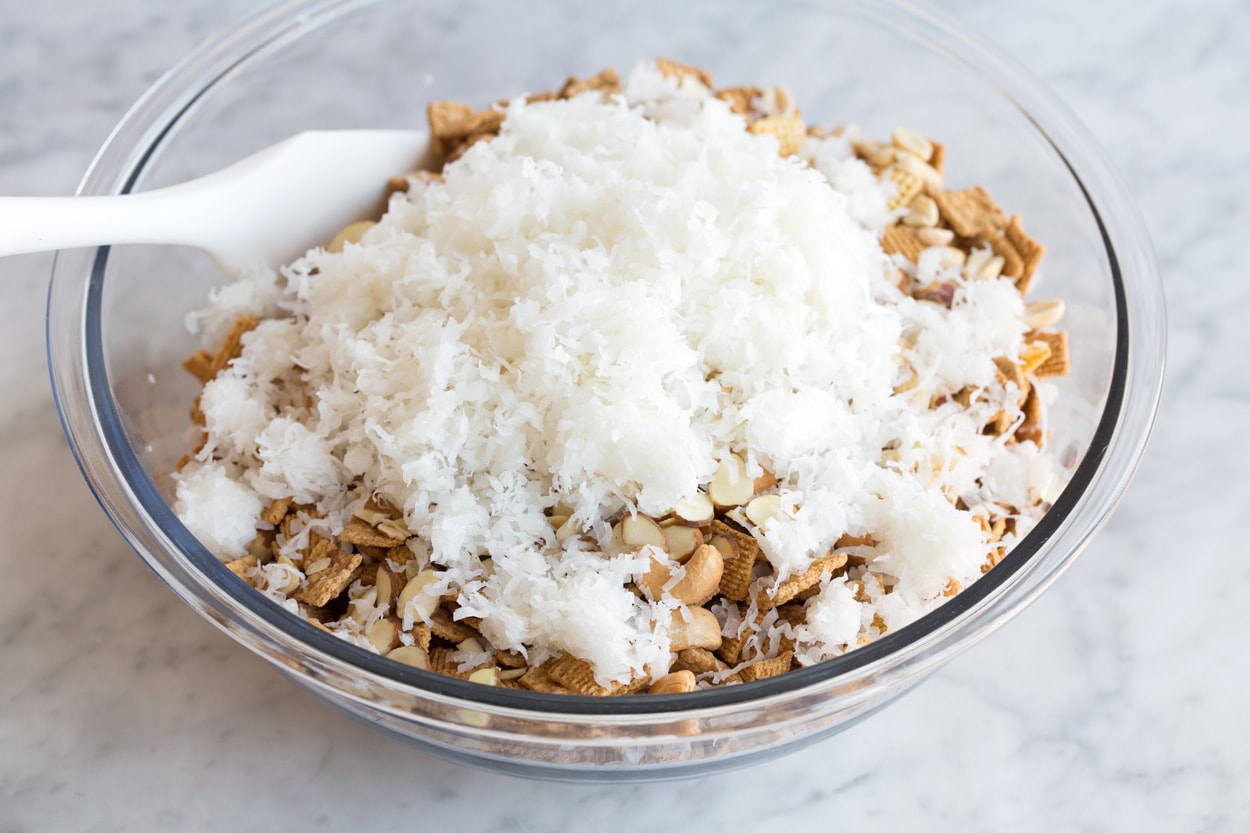Showing how to make sweet chex mix.