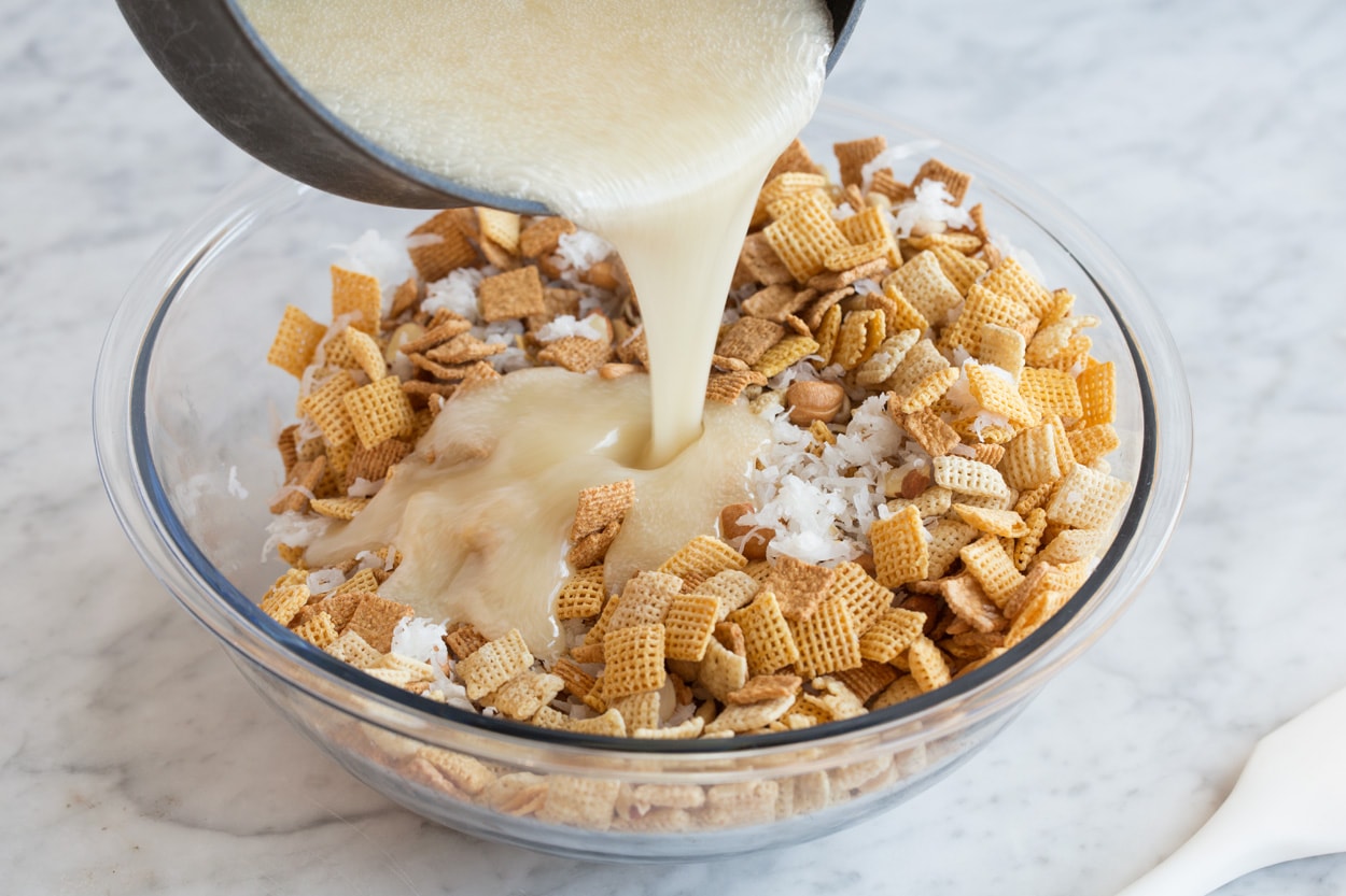 Showing how to make sweet chex mix.
