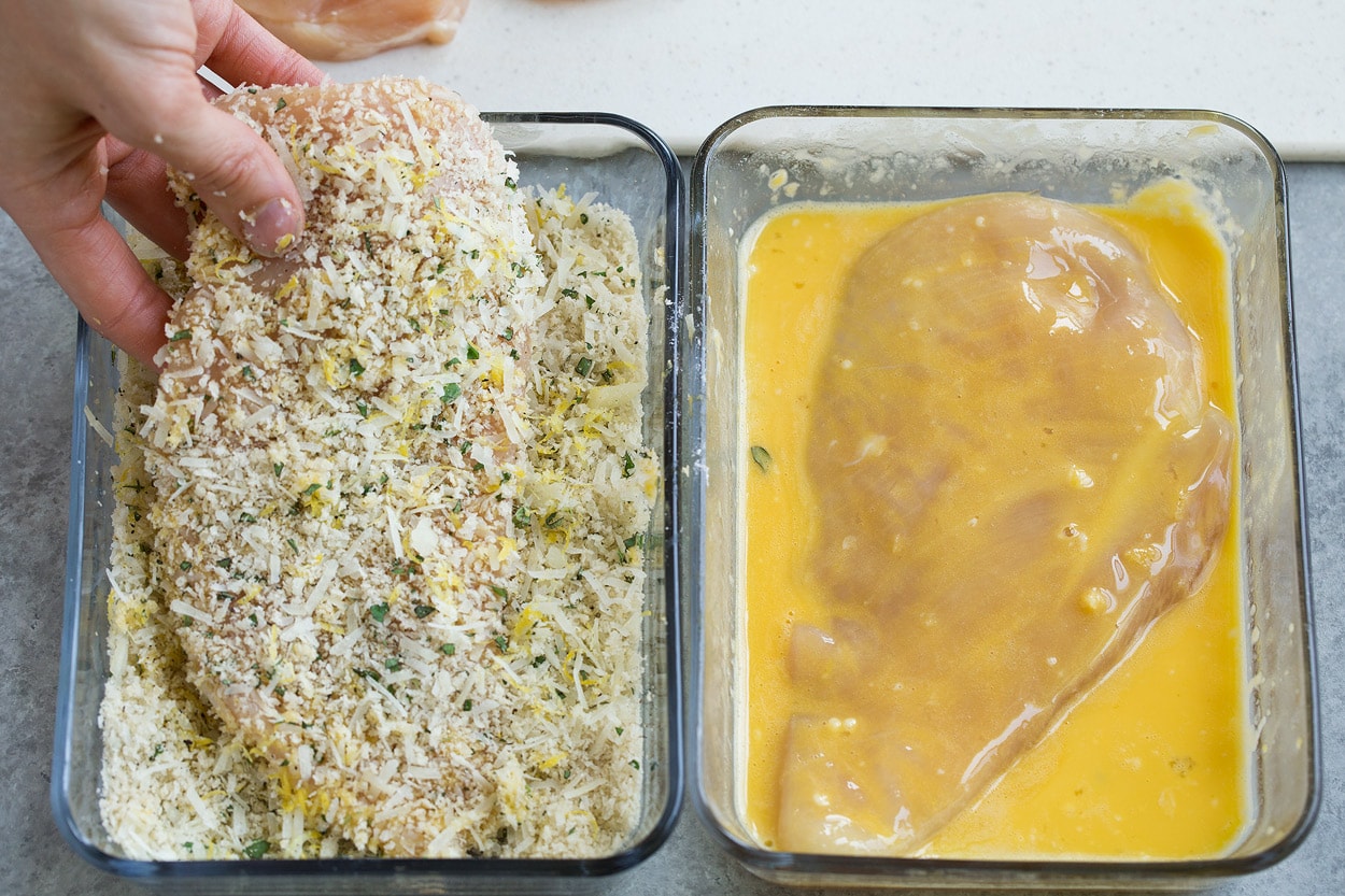 dredging chicken in egg and panko mixture for lemon chicken romano