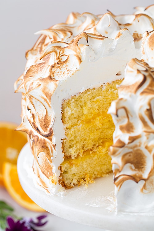 close up show of sliced Orange Chiffon Cake with Orange Filling and Meringue frosting