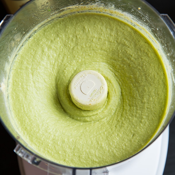 This creamy delicious homemade hummus recipe is the best! It can be made in under 10 minutes and it makes the perfect midday snack for you and your family, or take it to a party and impress your friends! #cookingclassy #hummus #avocado #dips Avocado Hummus in a blender