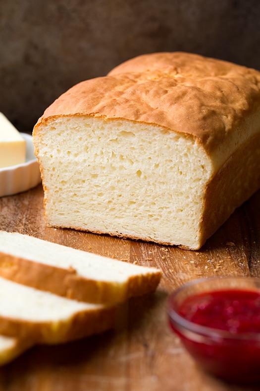 Gluten-Free Bread loaf on wood cutting board