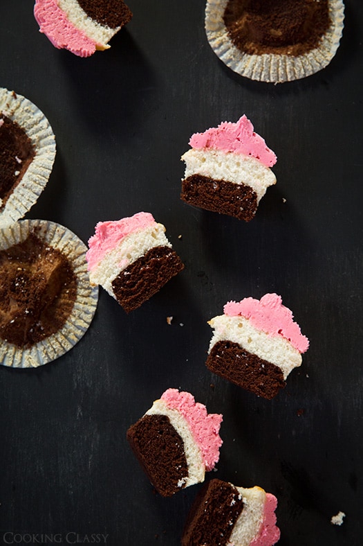 Neapolitan Cupcakes cut in half on counter