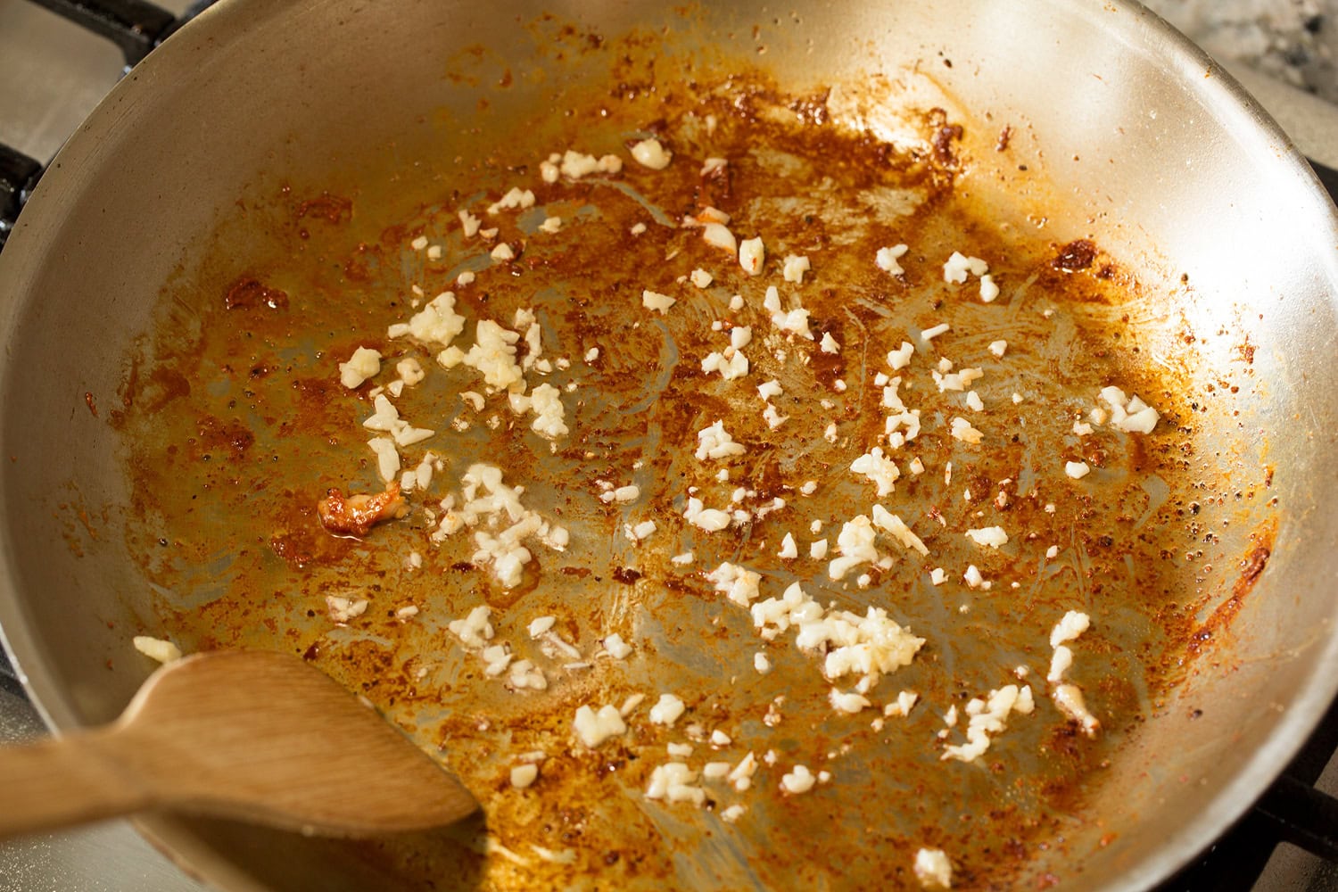 Garlic sauteed in skillet.