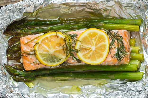 Baked Salmon and Asparagus in Foil Cooked salmon after baking in oven.