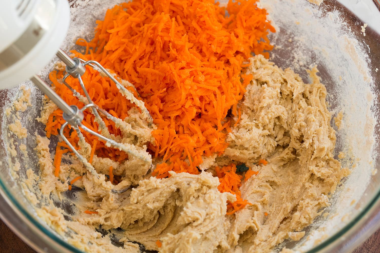 Finely shredded carrots added to flour butter mixture.