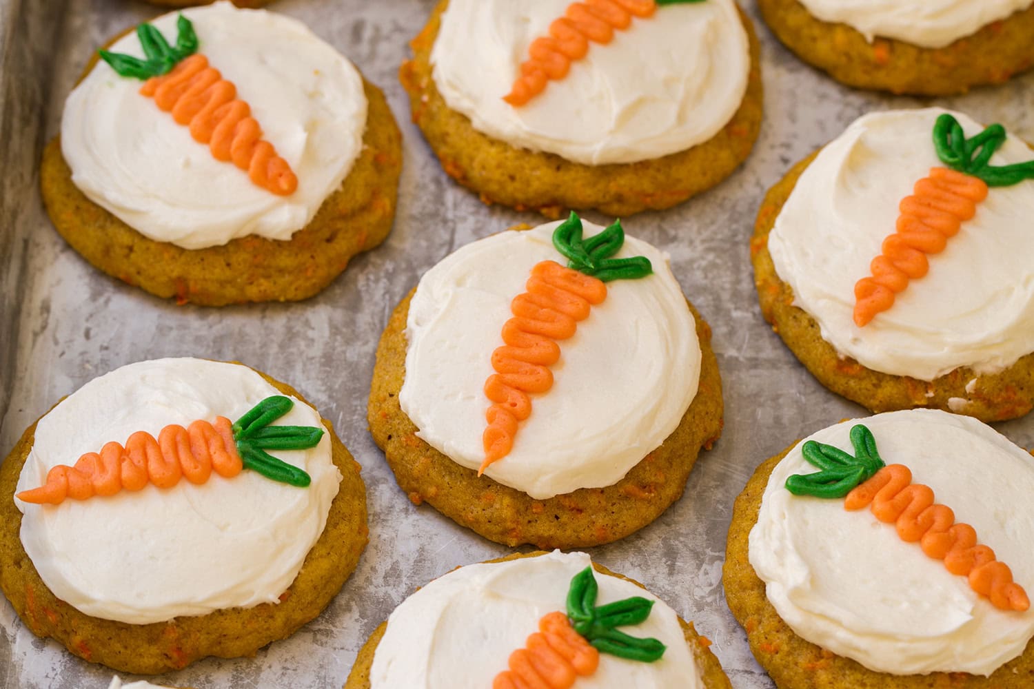 Decorated and completed homemade carrot cake cookies.