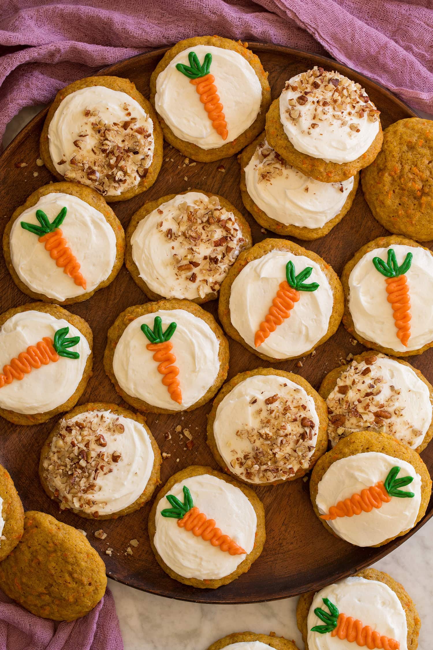 Overhead photo of frosted carrot cake cookies.