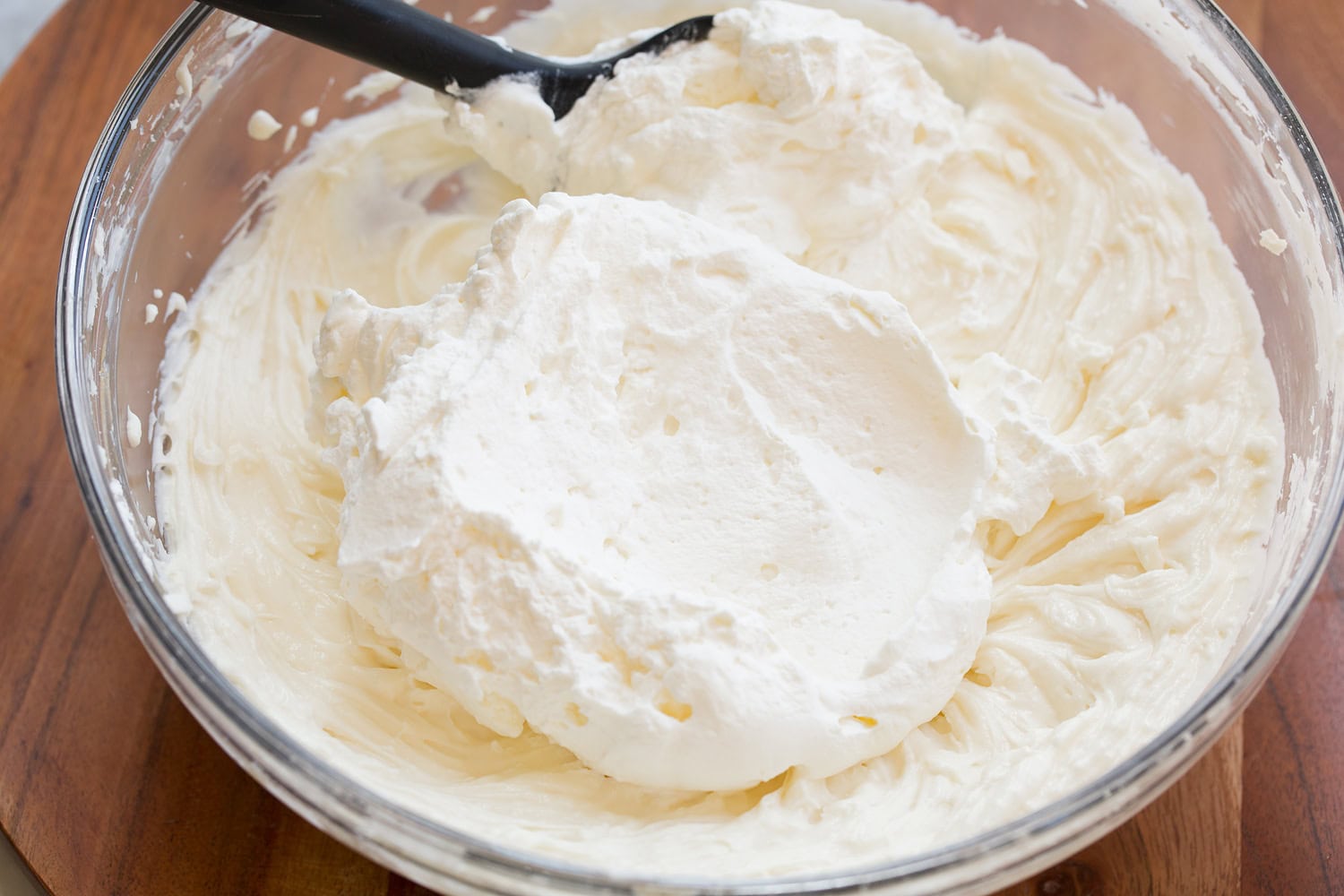 Whipped cream added to cream cheese mixture.