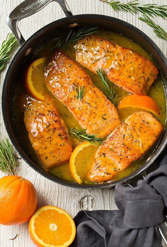 Orange Glazed Salmon with Rosemary Cooking In Skillet 