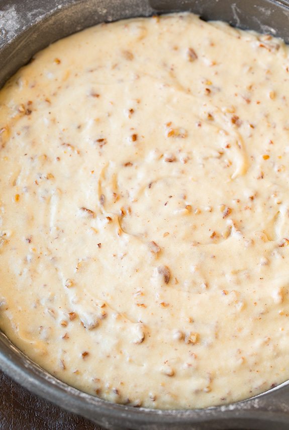 Butter Pecan Cake batter in cake pan before baking.