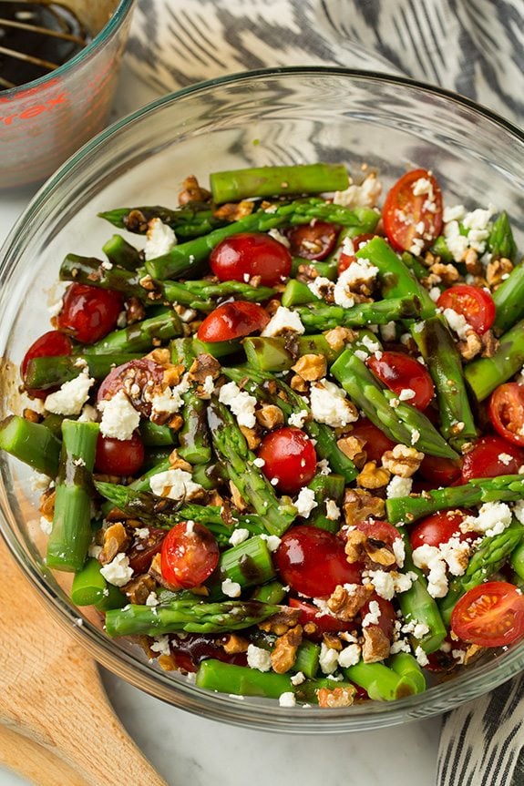 Asparagus, Tomato and Feta Salad in a glass bowl