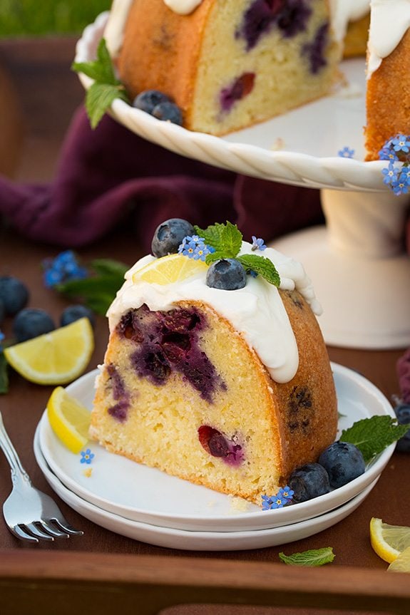 slice of Lemon Blueberry Bundt Cake on white plate