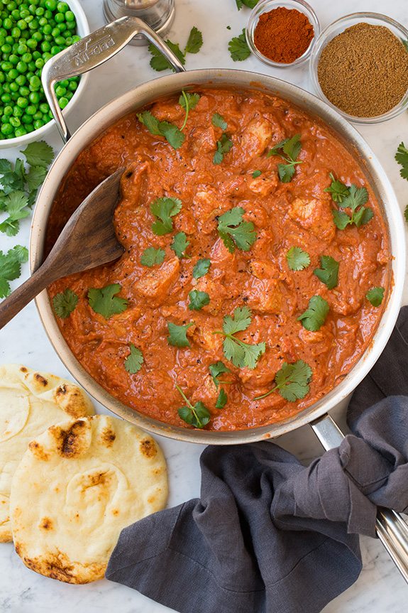 Chicken Tikka Masala in pan garnished with cilantro 