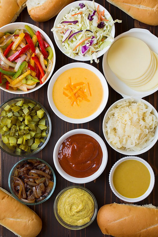 Bratwurst with Caramelized Onions and Cheddar Cheese Sauce | Cooking Classy