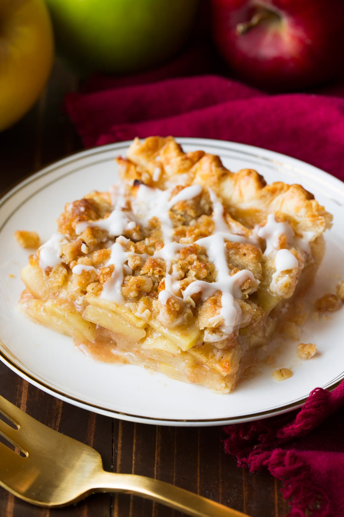 Single slice of apple slab pie on a small dessert plate.