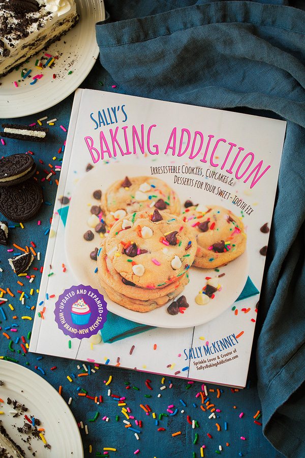 Oreo Cheesecake Sally's Baking Addiction Cookbook with recipe Oreo Cheesecake inside.