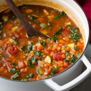 Lentil Soup in a large white cast iron pot