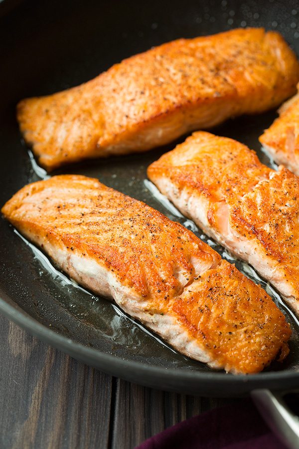 Showing how to cook salmon in a pan