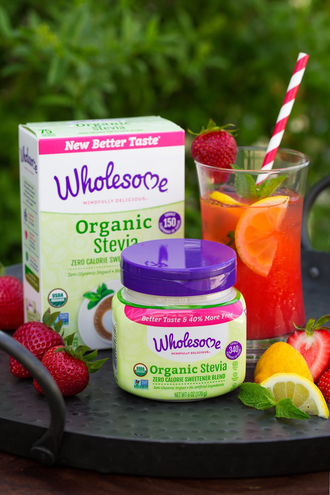 glass of sugar free lemonade on tray with stevia packages