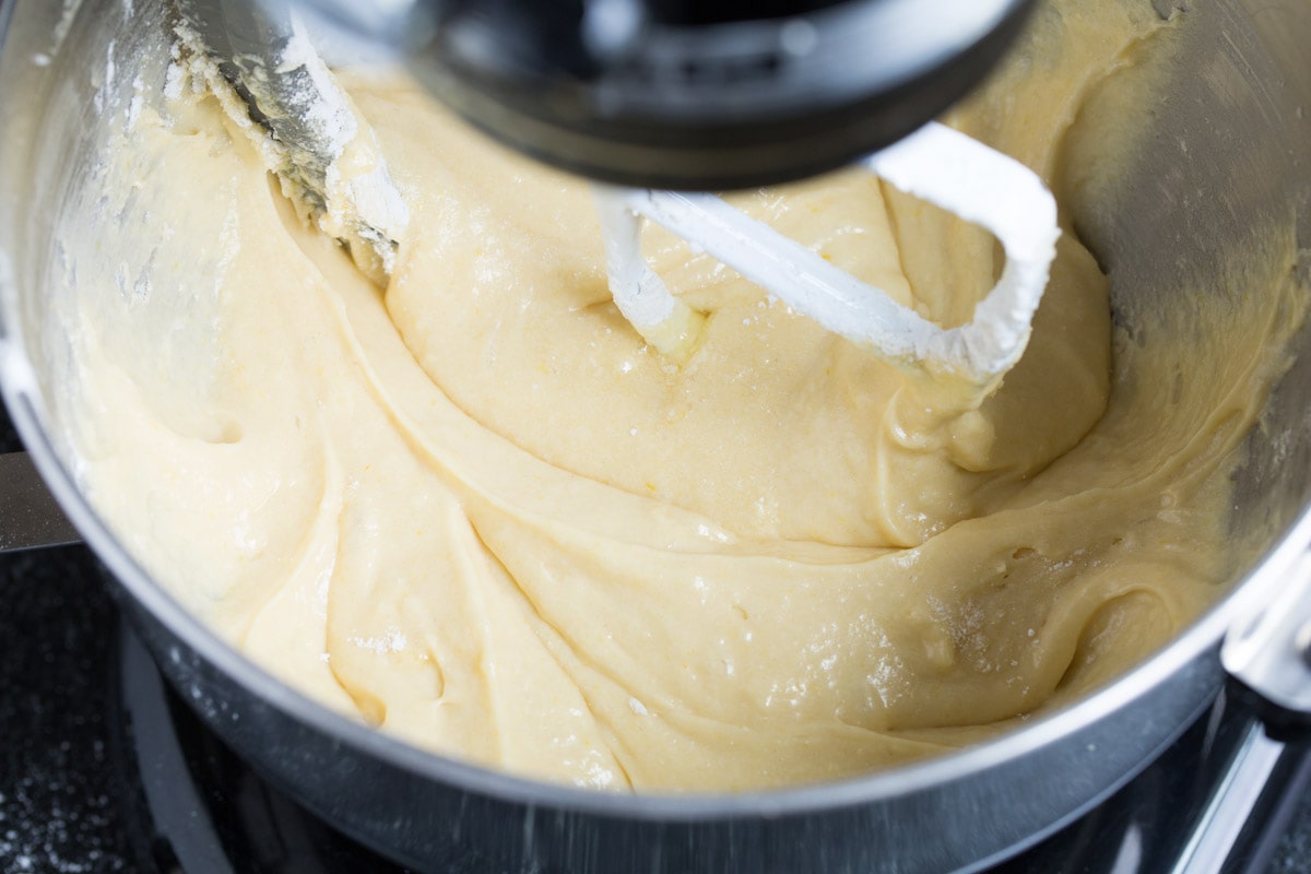 Prepared tres leches cake batter in a mixing bowl.
