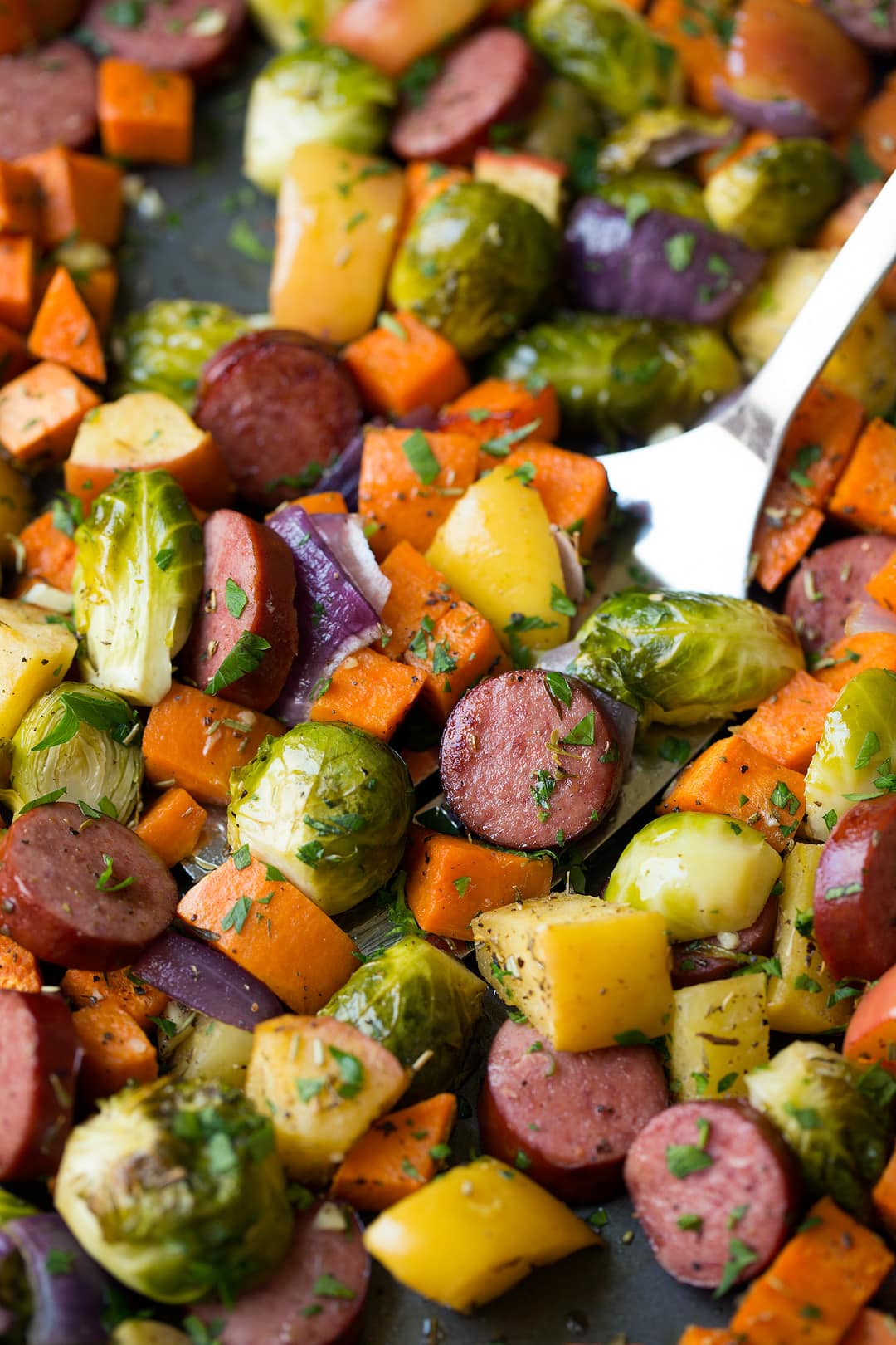 Sheet Pan Dinner with Turkey Sausage Sweet Potatoes Brussels Sprouts Apples and Red Onions