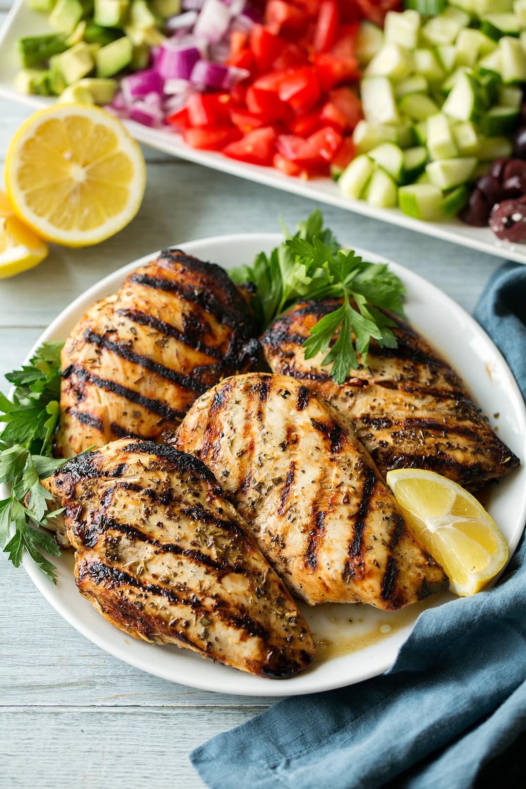 grilled greek chicken on white plate 