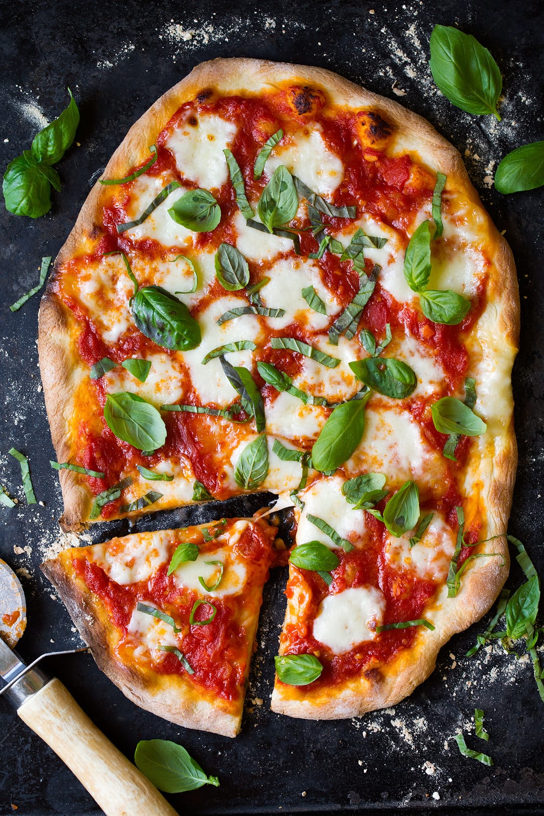 Margherita Pizza on a floured surface 