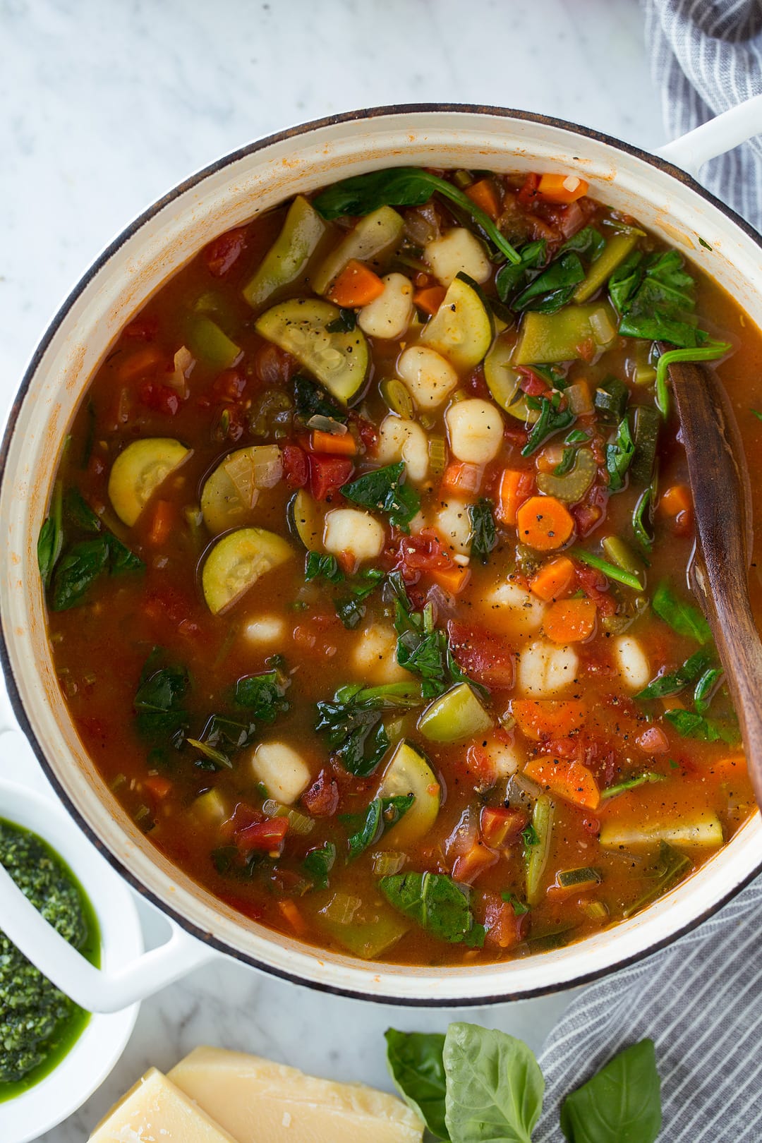 Gnocchi Vegetable Soup with Pesto and Parmesan in a large pot
