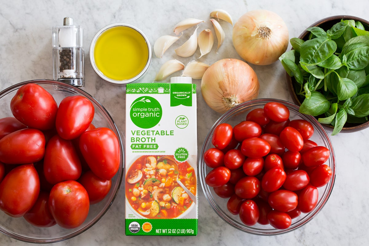 Ingredients needed to make tomato basil soup.
