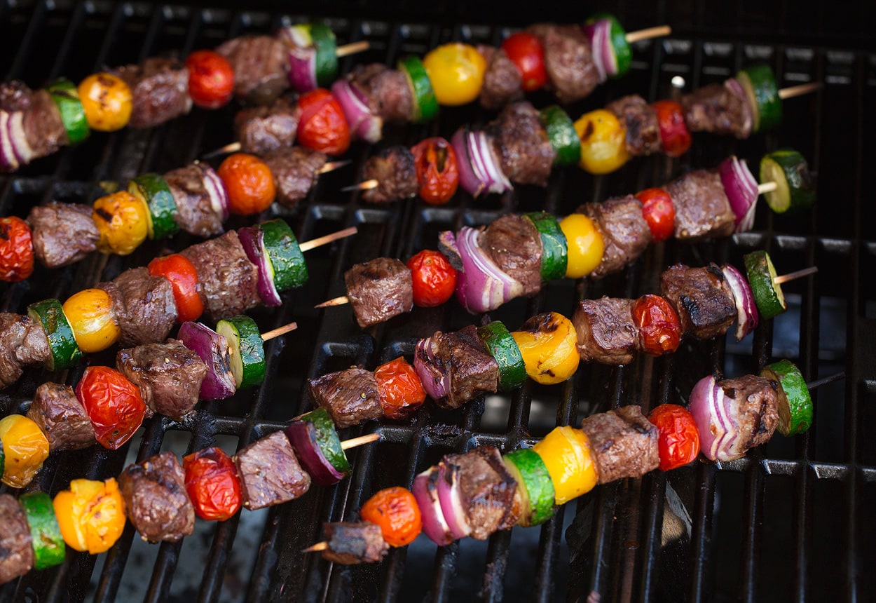 steak kebabs on grill