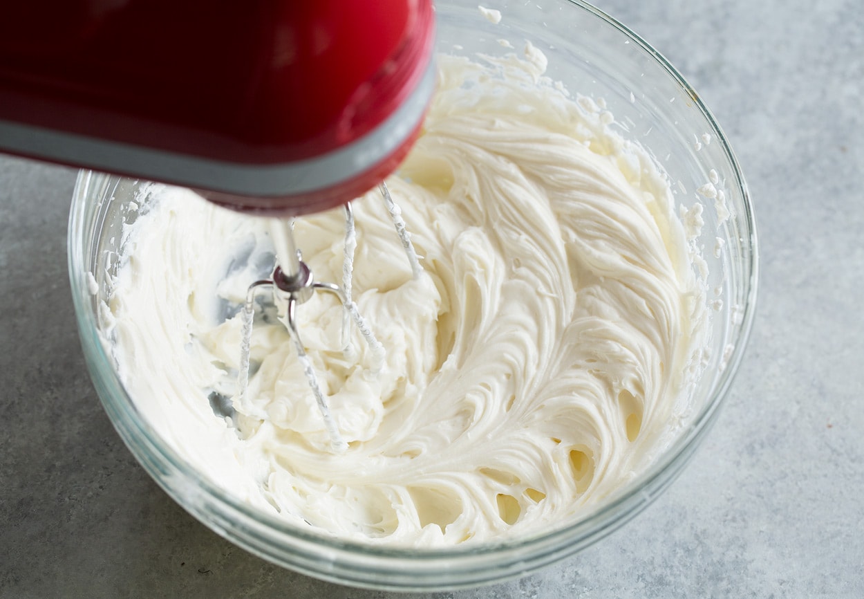 Berry Cheesecake Fruit Salad whipping cream cheese and sugar until fluffy