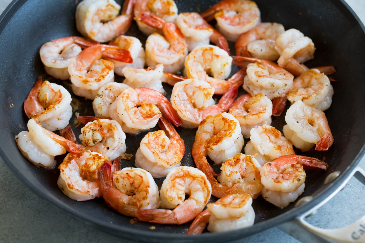 Orange Garlic Shrimp sauteing shrimp in non-stick 12-inch skillet