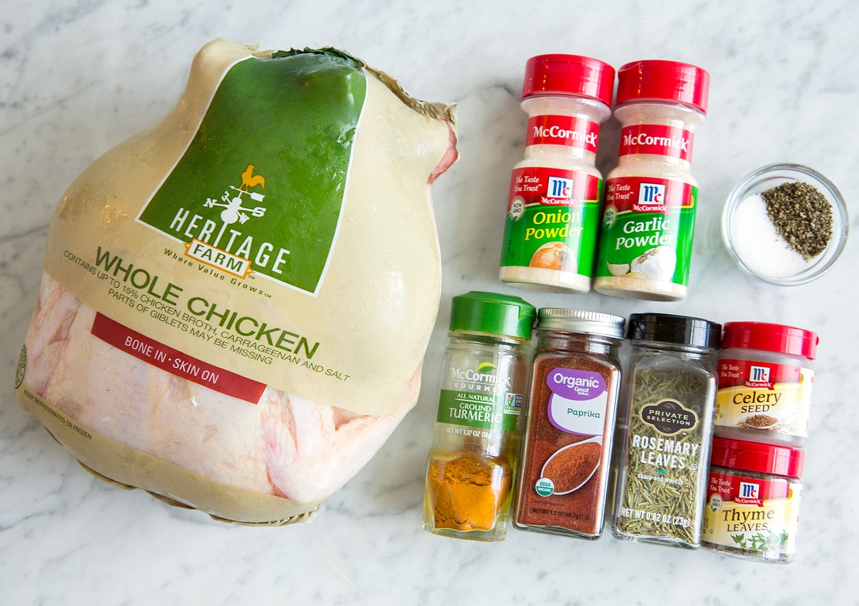 Slow cooker chicken ingredients whole chicken paprika onion powder garlic powder thyme rosemary turmeric celery seed