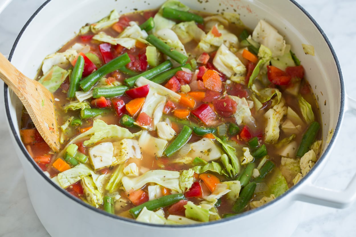 Cabbage soup cooking in a large pot.