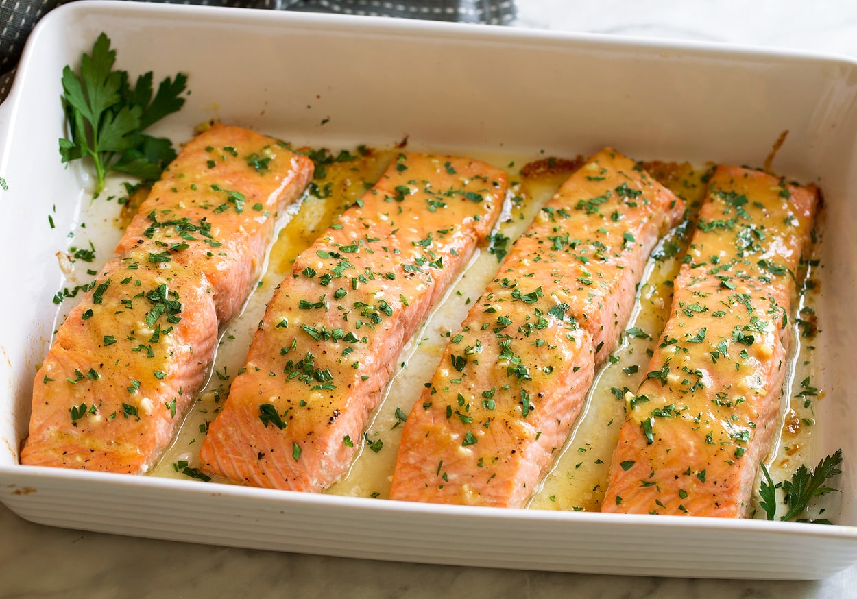 Showing what salmon should look like after baking for doneness.