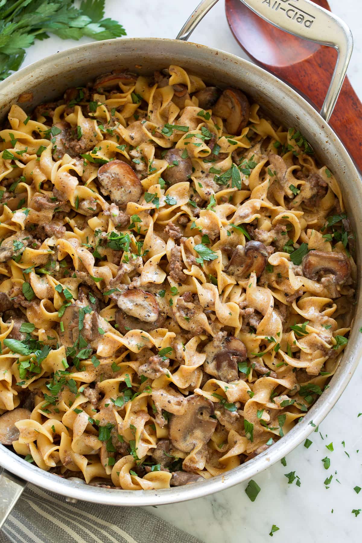 Close up overhead image of beef stroganoff in a saute pan. 