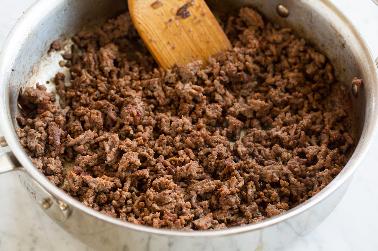 Cooked ground beef pictured here in saute pan.