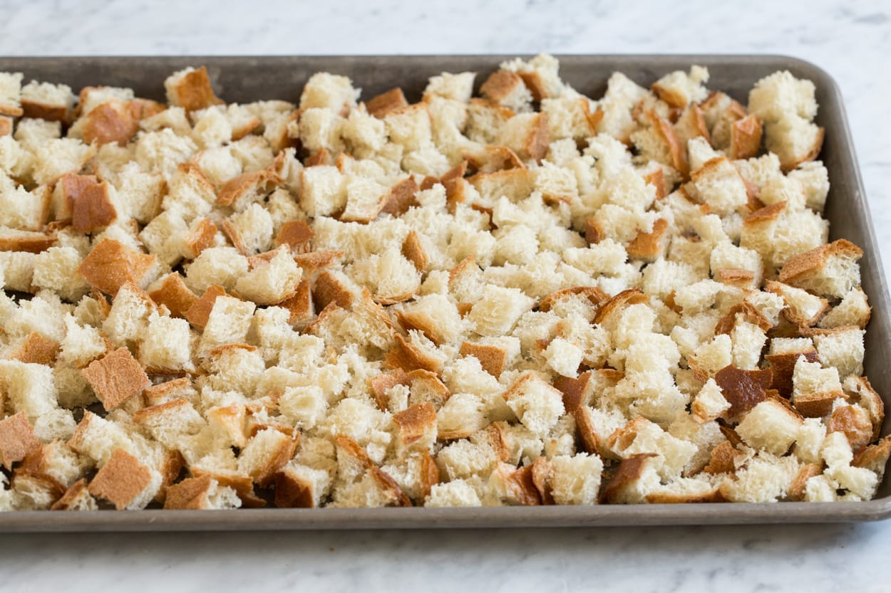 bread pudding toasting bread cubes on sheet pan