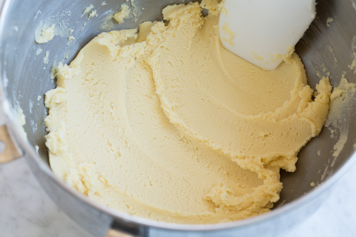 Butter cookies finished cookie dough mixture in mixing bowl.