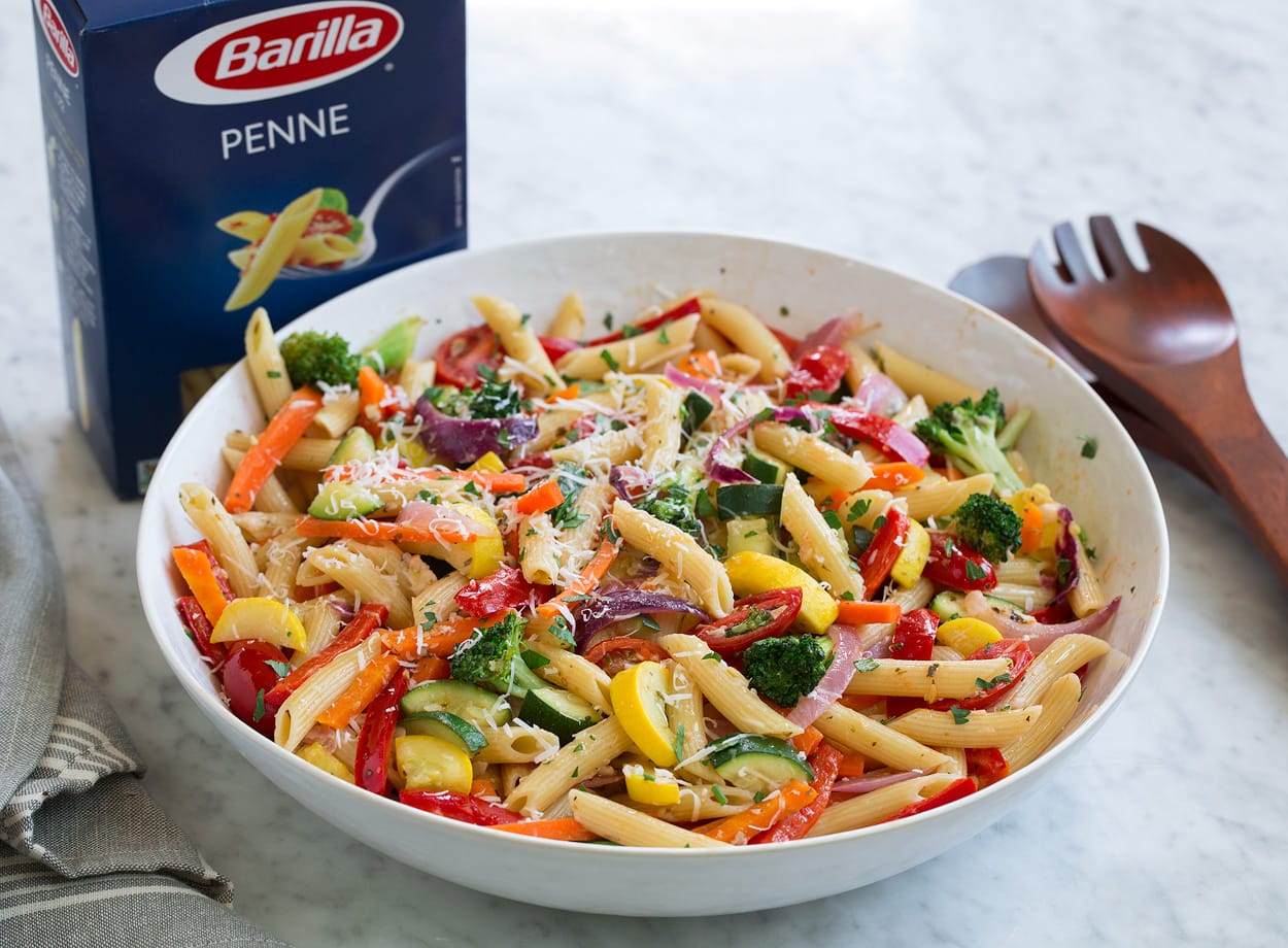 Pasta Primavera shown here in a serving bowl sitting on a marble surface