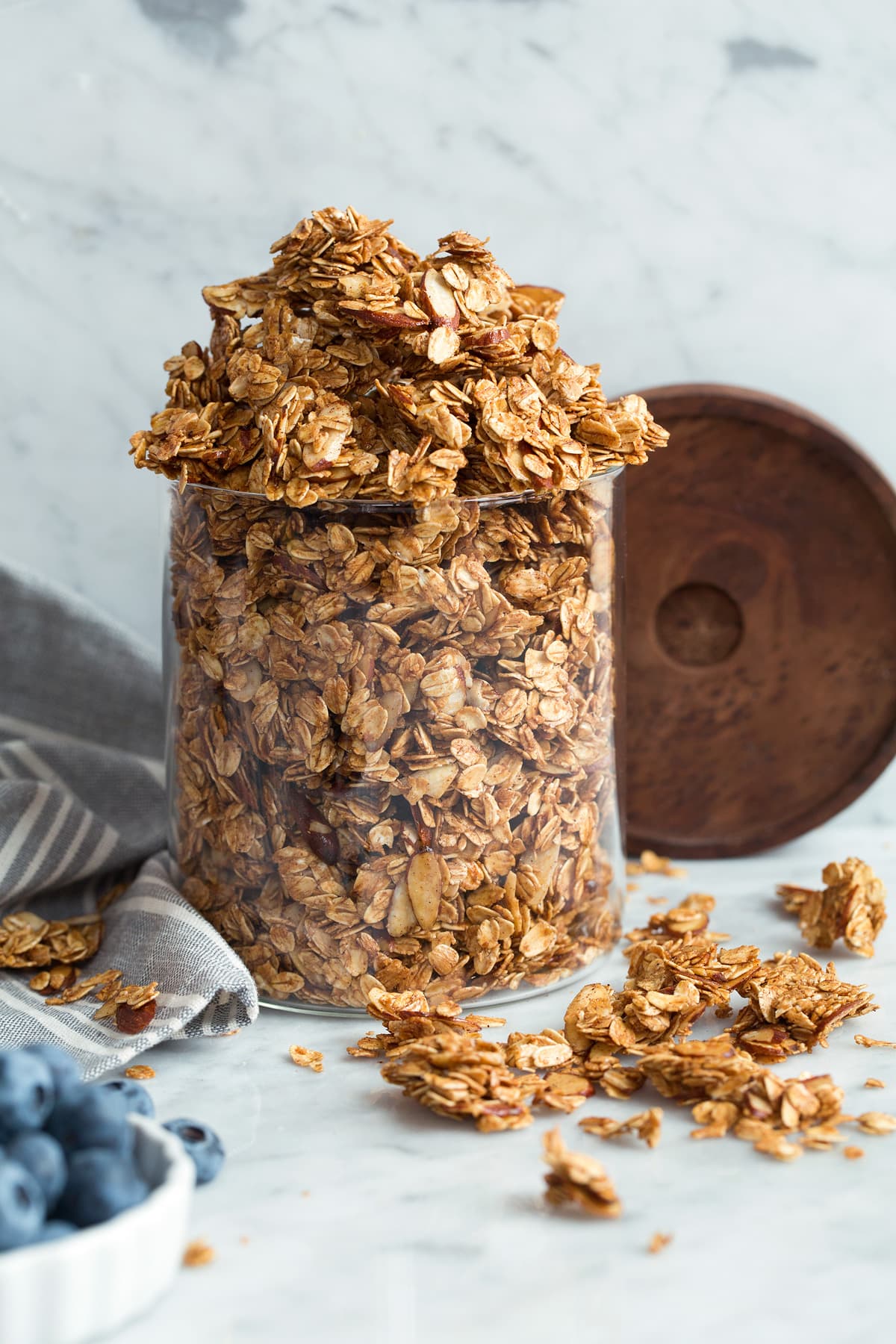 Homemade granola in a glass storage jar.