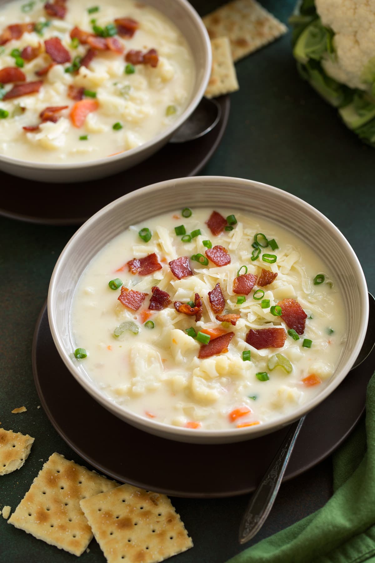 Cauliflower Soup in two serving bowls.
