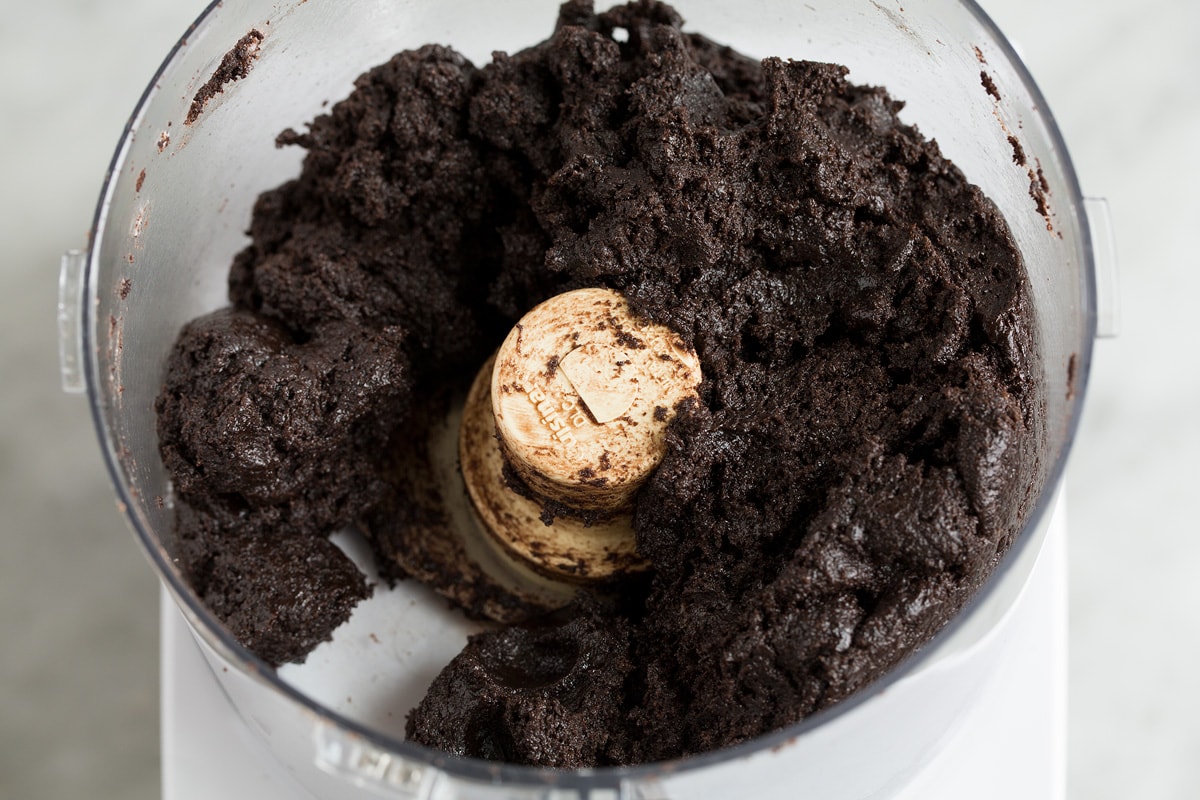 Blended oreo truffle mix in a food processor.