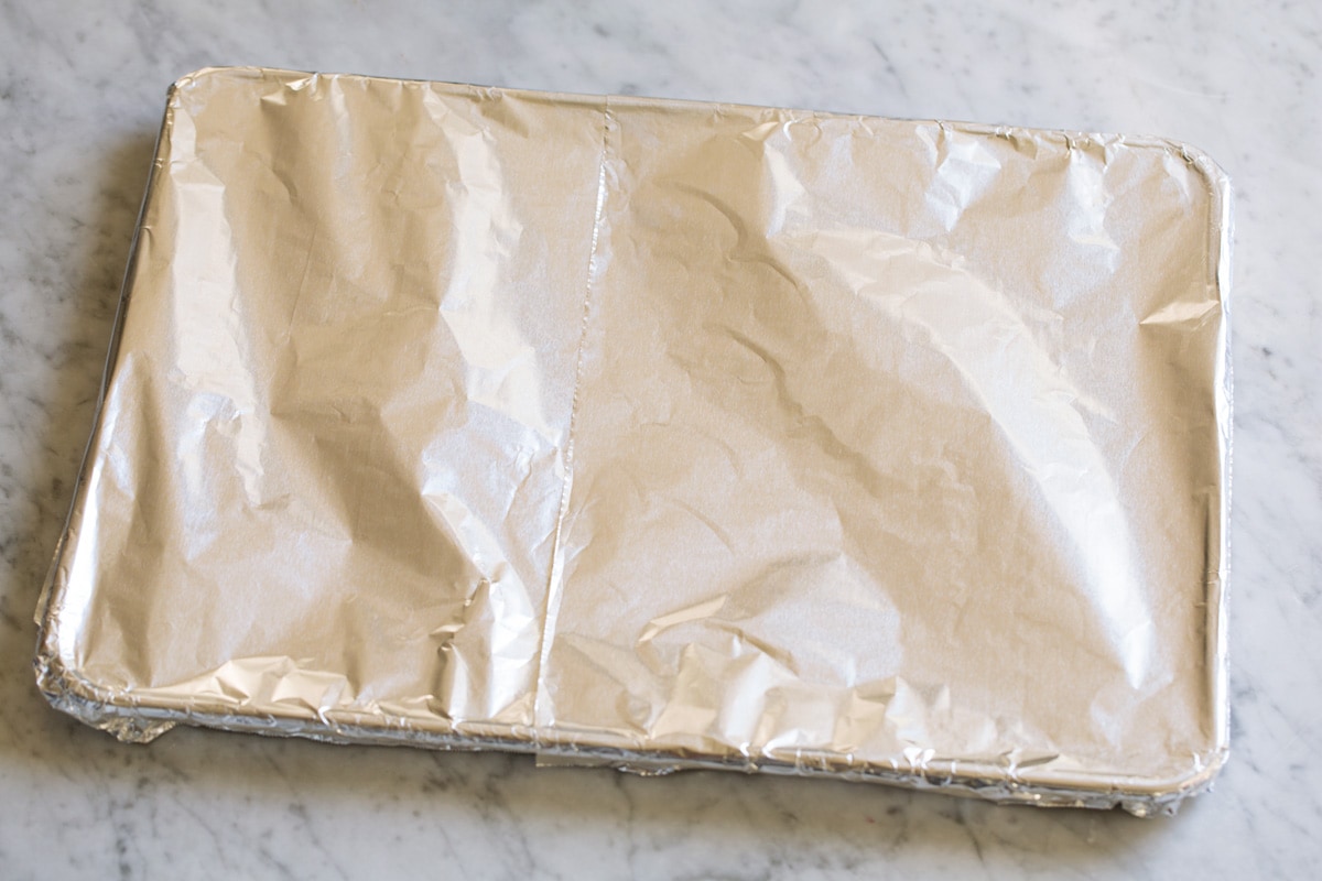 Baked French Fries Covering baking sheet with aluminum foil.