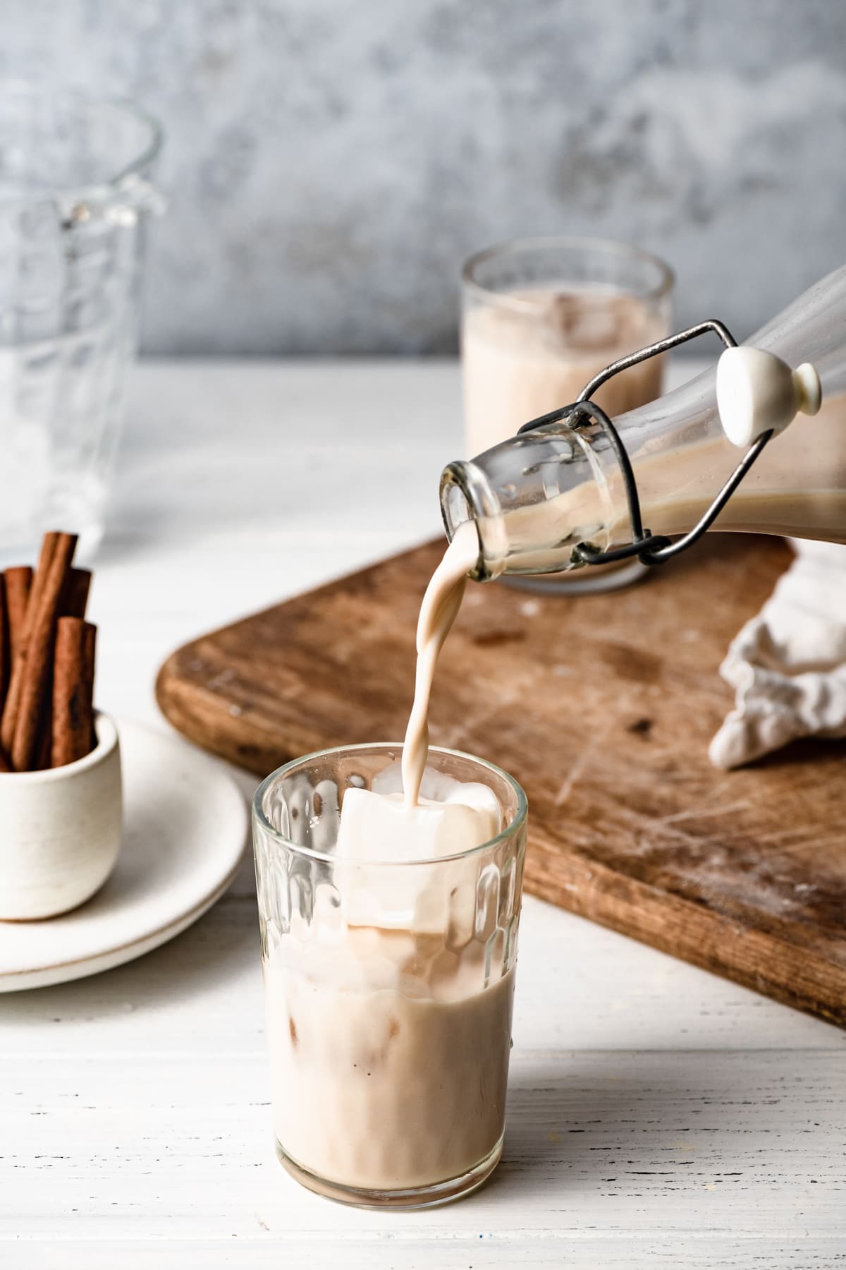 Horchata Pouring horchata into a cup with ice.