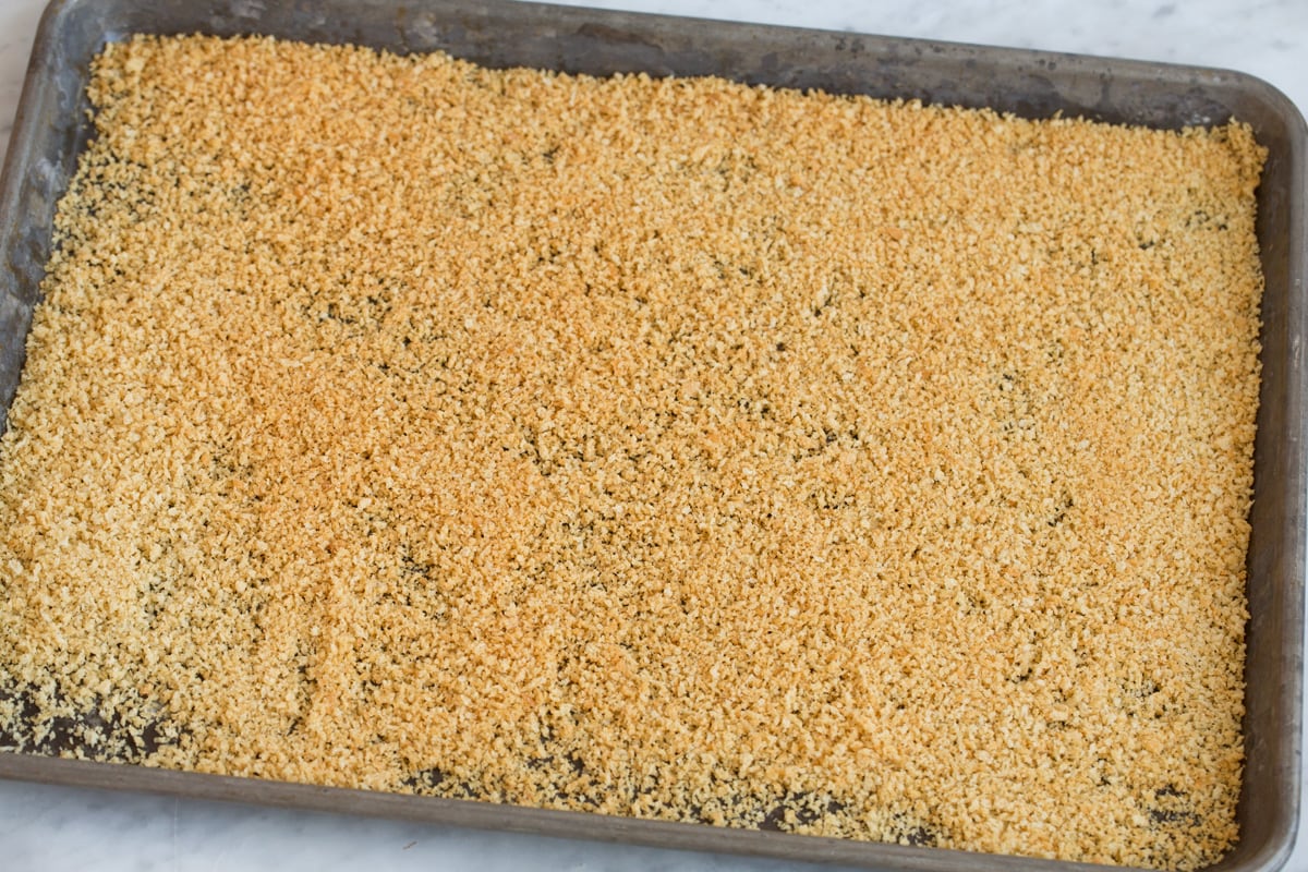 Showing how to toast panko on a baking sheet.